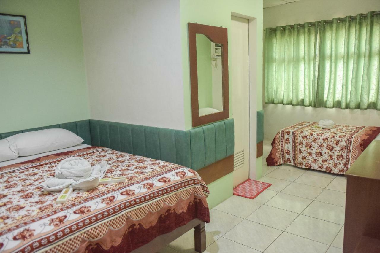 Tiptop Tower Suite Inn Dumaguete City Extérieur photo
